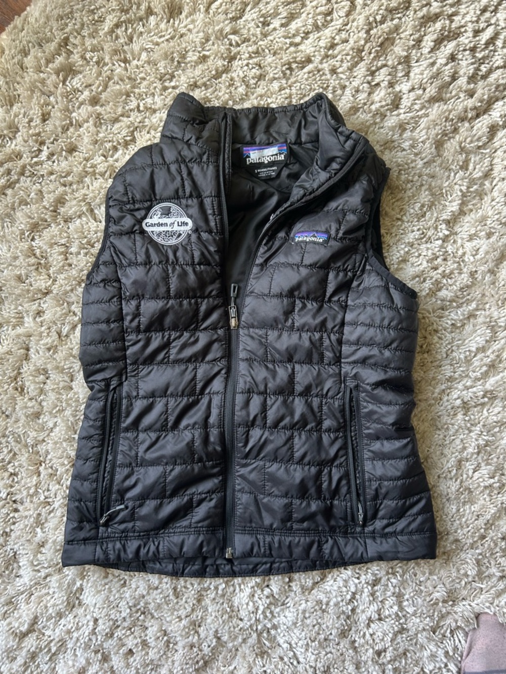 Patagonia Nano Puff–style insulated vest with a embroidered logo